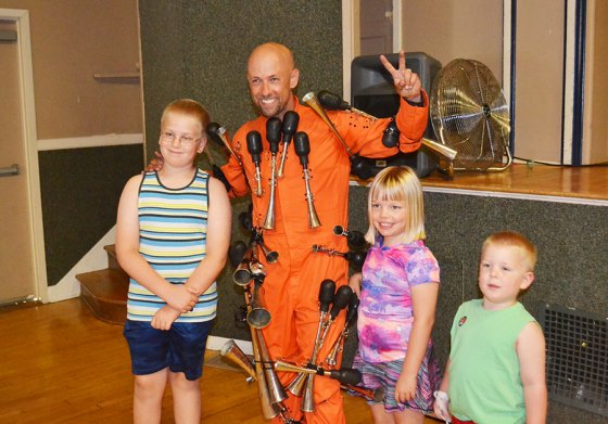 Dave Enns performed for a bunch of kids and their parents Wednesday in the Lemoore Civic Auditorium. Enns is known as Dave the Horn Guy in his act.